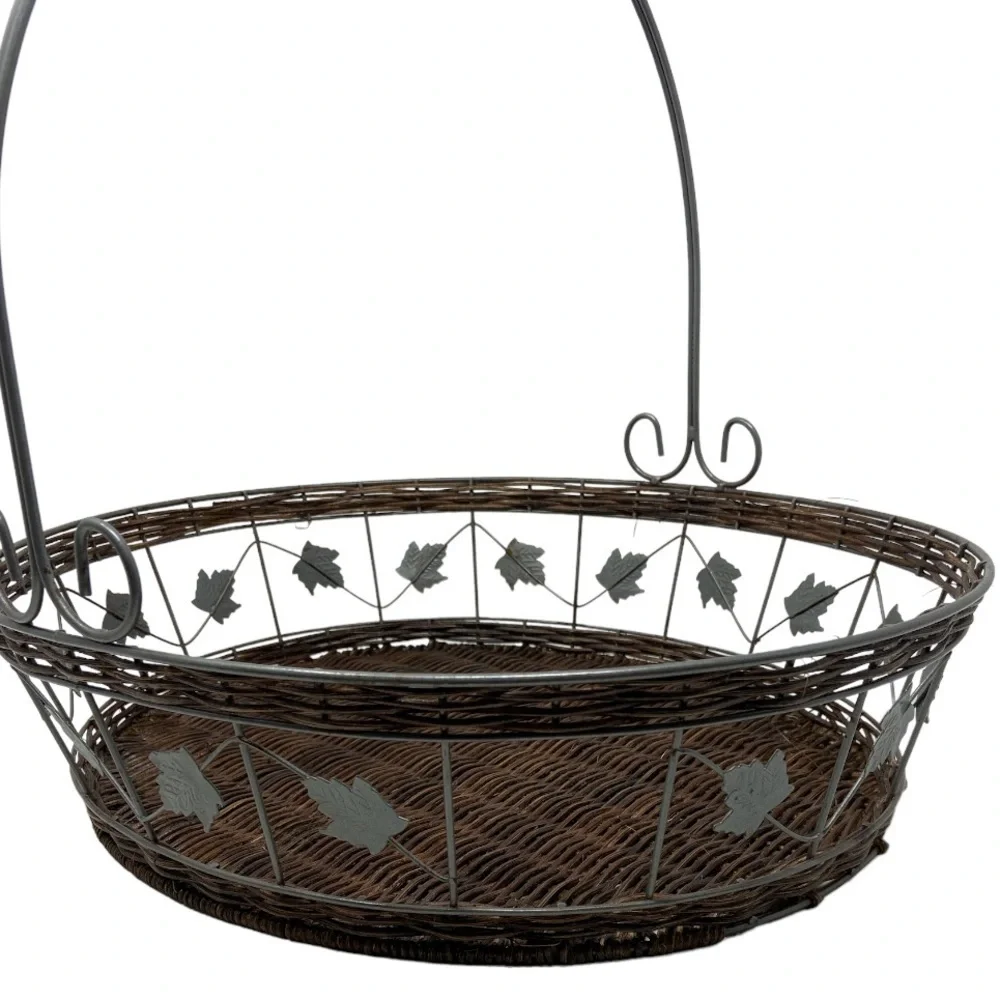 Rattan/Wicker Metal Brown Basket with Leaf Embellishment.